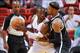 Oct 25, 2013; Miami, FL, USA; Miami Heat shooting guard Dwyane Wade (left) is defended by Brooklyn Nets small forward Paul Pierce (right) during the first quarter at American Airlines Arena. Mandatory Credit: Steve Mitchell-USA TODAY Sports