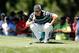 Aug 10, 2013; Rochester, NY, USA; Rory McIlroy lines up his putt on the 4th green during the third round of the 95th PGA Championship at Oak Hill Country Club. Mandatory Credit: Winslow Townson-USA TODAY Sports