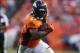 Oct 27, 2013; Denver, CO, USA; Denver Broncos running back Knowshon Moreno (27) runs with the ball during the second half against the Washington Redskins at Sports Authority Field at Mile High. The Broncos won 45-21. Mandatory Credit: Chris Humphreys-USA