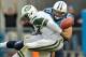 Sep 29, 2013; Nashville, TN, USA; Tennessee Titans defensive tackle Karl Klug (97) sacks New York Jets quarterback Geno Smith (7) forcing a fumble that is returned for a touchdown during the second half at LP Field. Tennessee won 38-13. Mandatory Credit: