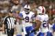 Oct 27, 2013; New Orleans, LA, USA; Buffalo Bills quarterback Thad Lewis (9) passes the ball to Buffalo Bills running back Fred Jackson (22) against the New Orleans Saints during the first half at Mercedes-Benz Superdome. New Orleans defeated Buffalo 35-1