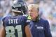 Sep 8, 2013; Charlotte, NC, USA; Seattle Seahawks head coach Pete Carroll talks to wide receiver Golden Tate (81) in the fourth quarter. The Seahawks defeated the Panthers 12-7 at Bank of America Stadium. Mandatory Credit: Bob Donnan-USA TODAY Sports