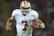 Oct 27, 2013; London, United Kingdom; San Francisco 49ers quarterback Colin Kaepernick (7) scores on a 12-yard touchdown run against the Jacksonville Jaguars in the NFL International Series game at Wembley Stadium. Mandatory Credit: Kirby Lee-USA TODAY Sp