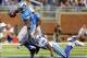Oct 27, 2013; Detroit, MI, USA; Detroit Lions wide receiver Calvin Johnson (81) is tackled after the catch by Dallas Cowboys cornerback Brandon Carr (39) during 1st half of a game at Ford Field. Mandatory Credit: Mike Carter-USA TODAY Sports