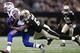 Oct 27, 2013; New Orleans, LA, USA; Buffalo Bills wide receiver Steve Johnson (13) is tackled by New Orleans Saints outside linebacker David Hawthorne (57) during the second half at Mercedes-Benz Superdome. New Orleans defeated Buffalo 35-17. Mandatory Cr