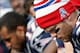 Oct 27, 2013; Foxborough, MA, USA; New England Patriots quarterback Tom Brady (12) hangs his head on the sidelines during the second quarter against the Miami Dolphins at Gillette Stadium. Mandatory Credit: Winslow Townson-USA TODAY Sports
