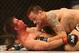 Jun 15, 2013; Winnipeg, MB, Canada; James Krause (top) fights Sam Stout during their Lightweight bout at UFC 161 at MTS Centre. Mandatory Credit: Tom Szczerbowski-USA TODAY Sports