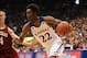 Oct 29, 2013; Lawrence, KS, USA; Kansas Jayhawks guard Andrew Wiggins (22) drives the baseline as Pittsburg State Gorillas guard Josiah Gustafson (4) defends during the first half at Allen Fieldhouse. The Jayhawks won 97-57. Mandatory Credit: Denny Medley