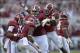Sep 28, 2013; Tuscaloosa, AL, USA; Alabama Crimson Tide defensive back Eddie Jackson (4) celebrates his interception with his teammates against the Mississippi Rebels during the first quarter at Bryant-Denny Stadium. Mandatory Credit: John David Mercer-U