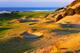 The par-four 13th hole at Pacific Dunes is a beast; 444 yards into the wind, uphill and hugging the coastline while protected by a plethora of bunkers from the fairway to the green.