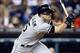 Sep 21, 2013; Detroit, MI, USA; Chicago White Sox second baseman Gordon Beckham (15) hits an RBI single in the seventh inning against the Detroit Tigers at Comerica Park. Mandatory Credit: Rick Osentoski-USA TODAY Sports