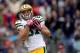 BALTIMORE, MD - OCTOBER 13: Jordy Nelson #87 of the Green Bay Packers catches a pass from Aaron Rodgers #12 (not pictured) and scores a touchdown in the third quarter during a game against the Baltimore Ravens at M&T Bank Stadium on October 13, 2013 in Ba