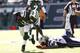 EAST RUTHERFORD, NJ - OCTOBER 20: Chris Ivory #33 of the New York Jets runs from Brandon Spikes #55 of the New England Patriots during their game at MetLife Stadium on October 20, 2013 in East Rutherford, New Jersey. (Photo by Jeff Zelevansky/Getty Ima