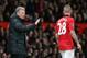 MANCHESTER, ENGLAND - OCTOBER 29: Manchester United manager David Moyes gives instructions to Alexander Buttner during the Capital One Cup Fourth Round match between Manchester United and Norwich City at Old Trafford on October 29, 2013 in Manchester, En