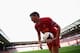 LIVERPOOL, ENGLAND - OCTOBER 05: Steven Gerrard of Liverpool collects the ball to take a corner during the Barclays Premier League match between Liverpool and Crystal Palace at Anfield on October 5, 2013 in Liverpool, England. (Photo by Clive Brunskill/