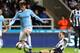 NEWCASTLE, UNITED KINGDOM - OCTOBER 30: Yohan Cabaye of Newcastle United (right) makes a challenge on David Silva of Manchester City during the Capital One Cup Fourth Round match between Newcastle United and Manchester City at St James' Park on October 30