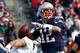 FOXBORO, MA - OCTOBER 27: Tom Brady #12 of the New England Patriots looks for an open man in the first half against the Miami Dolphins at Gillette Stadium on October 27, 2013 in Foxboro, Massachusetts. (Photo by Jim Rogash/Getty Images)