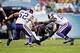 Sep 15, 2013; Chicago, IL, USA; Chicago Bears wide receiver Brandon Marshall (15) is tackled by Minnesota Vikings outside linebacker Erin Henderson (50) and outside linebacker Chad Greenway (52) during the second quarter at Soldier Field. Mandatory Credit