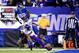 EAST RUTHERFORD, NJ - OCTOBER 21: Wide receiver Rueben Randle #82 of the New York Giants catches a touchdown in the second quarter as cornerback Chris Cook #20 of the Minnesota Vikings defends during a game at MetLife Stadium on October 21, 2013 in East