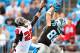 CHARLOTTE, NC - DECEMBER 09: Greg Olsen #88 of the Carolina Panthers makes a touchdown catch against Thomas DeCoud #28 of the Atlanta Falcons during play at Bank of America Stadium on December 9, 2012 in Charlotte, North Carolina. (Photo by Grant Halverso