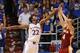 Oct 29, 2013; Lawrence, KS, USA; Pittsburg State Gorillas guard Josiah Gustafson (4) shoots the ball as Kansas Jayhawks guard Andrew Wiggins (22) defends during the first half at Allen Fieldhouse. The Jayhawks won 97-57. Mandatory Credit: Denny Medley-USA
