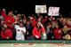 BOSTON, MA - OCTOBER 30: Fans react after the Boston Red Sox defeated the St. Louis Cardinals 6-1 in Game Six of the 2013 World Series at Fenway Park on October 30, 2013 in Boston, Massachusetts. (Photo by Jamie Squire/Getty Images)