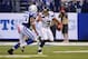 INDIANAPOLIS, IN - OCTOBER 06: Jerrell Freeman #50 of the Indianapolis Colts takes down Russell Wilson #3 of the Seattle Seahawks during a game at Lucas Oil Stadium on October 6, 2013 in Indianapolis, Indiana. (Photo by Jonathan Moore/Getty Images)