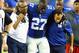 EAST RUTHERFORD, NJ - AUGUST 24: Stevie Brown #27 of the New York Giants is helped off the field after injuring his leg after making an interception against Geno Smith #7 of the New York Jets during their pre season game at MetLife Stadium on August 24