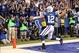 Oct 20, 2013; Indianapolis, IN, USA; Indianapolis Colts quarterback Andrew Luck (12) spikes the ball after scoring a touchdown against the Denver Broncos during the game at Lucas Oil Stadium. Mandatory Credit: Brian Spurlock-USA TODAY Sports