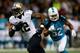 NEW ORLEANS, LA - SEPTEMBER 30: Marques Colston #12 of the New Orleans Saints runs past Philip Wheeler #52 of the Miami Dolphins at the Mercedes-Benz Superdome on September 30, 2013 in New Orleans, Louisiana. (Photo by Chris Graythen/Getty Images)