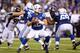 INDIANAPOLIS, IN - OCTOBER 20: Andrew Luck #12 of the Indianapolis Colts throws the ball during the game against the Denver Broncos at Lucas Oil Stadium on October 20, 2013 in Indianapolis, Indiana. (Photo by Andy Lyons/Getty Images)