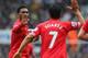 NEWCASTLE UPON TYNE, ENGLAND - OCTOBER 19: Daniel Sturridge of Liverpool high fives Luis Suarez of Liverpool during the Barclays Premier League match between Newcastle United and Liverpool at St James' Park on October 19, 2013 in Newcastle upon Tyne, Eng