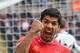 NEWCASTLE UPON TYNE, ENGLAND - OCTOBER 19: Luis Suarez of Liverpool celebrates as Daniel Sturridge of Liverpool (not pictured) score their second goal during the Barclays Premier League match between Newcastle United and Liverpool at St James' Park on Oc