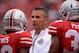 COLUMBUS, OH - SEPTEMBER 21: Head Coach Urban Meyer of the Ohio State Buckeyes watches his team warm up before playing the Florida A&M Rattlers at Ohio Stadium on September 21, 2013 in Columbus, Ohio. Ohio State defeated FAMU 76-0. (Photo by Jamie Sabau