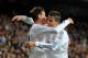 MADRID, SPAIN - OCTOBER 30: Gareth Bale (L) of Real Madrid CF celebrates with Cristiano Ronaldo after scoring Real's opening goal during the La Liga match between Real Madrid CF and Sevilla FC at the Santiago Bernabeu Stadium on October 30, 2013 in Madri