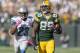 GREEN BAY, WI - OCTOBER 6: James Jones #89 of the Green Bay Packers runs during a 83 yard touchdown catch against the Chris Houston #23 of the Detroit Lions at Lambeau Field on October 6, 2013 in Green Bay, Wisconsin. The Packers defeated the Lions 22-9