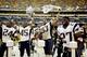 Patriots players celebrate winning the AFC championship at Heinz Field in 2001.