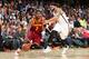 CLEVELAND, OH - OCTOBER 30: Kyrie Irving #2 of the Cleveland Cavaliers drives against Deron Williams #8 of the Brooklyn Nets during a game at the Quicken Loans Arena on October 30, 2013 in Cleveland, Ohio. NOTE TO USER: User expressly acknowledges and agr