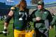 Oct 6, 2013; Green Bay, WI, USA; Green Bay Packers head coach Mike McCarthy celebrates a 22-9 win over the Detroit Lions with guard Josh Sitton (71) at Lambeau Field. Mandatory Credit: Benny Sieu-USA TODAY Sports