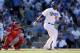 LOS ANGELES, CA - OCTOBER 16: Carl Crawford #25 of the Los Angeles Dodgers hits a solo home run in the fifth inning against the St. Louis Cardinals in Game Five of the National League Championship Series at Dodger Stadium on October 16, 2013 in Los Angel