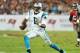 TAMPA, FL - OCTOBER 24: Quarterback Cam Newton #1 of the Carolina Pantherz runs upfield in the 2nd half against the Tampa Bay Buccaneers October 24, 2013 at Raymond James Stadium in Tampa, Florida. Carolina won 31 - 13. (Photo by Al Messerschmidt/Getty I