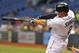 Kelly Johnson gets a hit against the Royals during a game on June 14.
