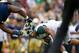 Sep 21, 2013; South Bend, IN, USA; Notre Dame Fighting Irish nose tackle Louis Nix (1) pulls the helmet off Michigan State Spartans running back Nick Hill (20) in the second quarter at Notre Dame Stadium. Nix was called for a face mask penalty. Mandatory