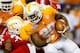 ATLANTA, GA - AUGUST 31: Rajion Neal #20 of the Tennessee Volunteers rushes against the North Carolina State Wolfpack at Georgia Dome on August 31, 2012 in Atlanta, Georgia. (Photo by Kevin C. Cox/Getty Images)