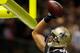 Impressively, Jimmy Graham dunked the football over the goal post while playing with a partial plantar fascia tear. Needless to say, he has a high pain tolerance.