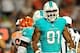 Oct 31, 2013; Miami Gardens, FL, USA; Miami Dolphins defensive end Cameron Wake (91) reacts after making a fumble recovery during the first quarter against the Cincinnati Bengals at Sun Life Stadium. Mandatory Credit: Steve Mitchell-USA TODAY Sports