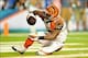 Oct 31, 2013; Miami Gardens, FL, USA; Cincinnati Bengals running back Gio Bernard (25) dives in for a touchdown during the fourth quarter against the Miami Dolphins at Sun Life Stadium. Mandatory Credit: Steve Mitchell-USA TODAY Sports