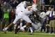 Oct 26, 2013; Fort Worth, TX, USA; Texas Longhorns defensive end Cedric Reed (88) defensive end Jackson Jeffcoat (44) and cornerback Quandre Diggs (6) cause TCU Horned Frogs quarterback Trevone Boykin (2) to fumble the ball in the first quarter of the gam