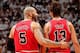 MIAMI, FL - MAY 15: Carlos Boozer #5 and Joakim Noah #13 of the Chicago Bulls speak before resuming play against the Miami Heat in Game Five of the Eastern Conference Semifinals during the 2013 NBA Playoffs on May 15, 2013 at American Airlines Arena in Mi
