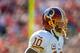 DENVER, CO - OCTOBER 27: Quarterback Robert Griffin III #10 of the Washington Redskins runs onto the field before a game against the Denver Broncos at Sports Authority Field Field at Mile High on October 27, 2013 in Denver, Colorado. (Photo by Dustin Br